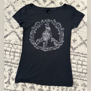 Women's Black Graphic Peace Sign Tee made of guns and grenades